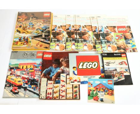 Lego a group of original instruction booklets, includes some early sets - 555, 1036 Teachers Guide To Technic, 7777 Railway, 