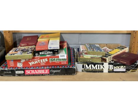 A quantity of vintage playing cards and other games.