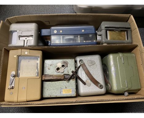 A quantity of vintage pigeon racing timer clocks.