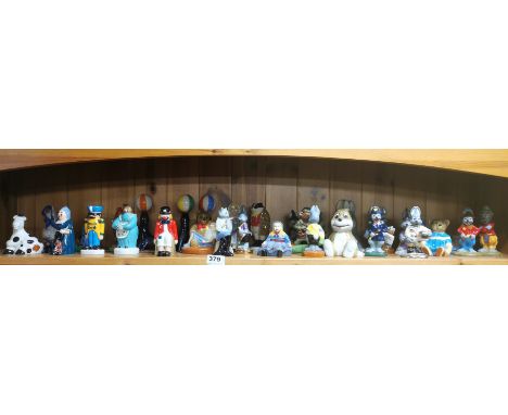 An extensive  group of Wade porcelain figures, tallest H. 50cm.