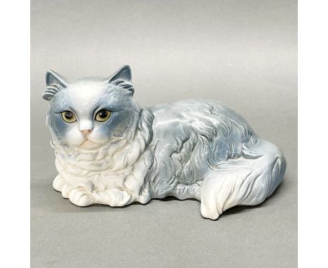 A Goebel porcelain cat figure, L. 22cm.