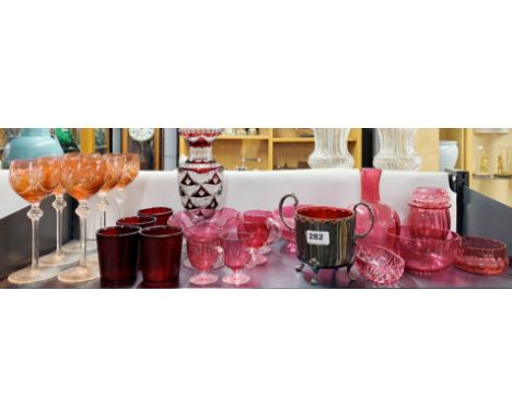 A quantity of mixed cranberry, ruby and other glassware, tallest H. 25cm.
