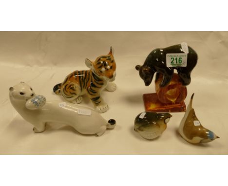 A collection of Russian and continental ceramic animals to include Bears, Tigers, Stoat birds etc 