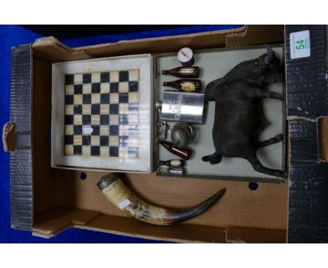 A mixed collection of items including Onyx chess set, Michelin man key ring, Guinness miniatures,  andf horn flask 