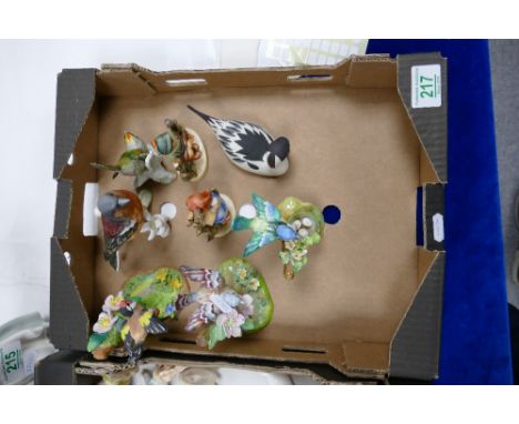 A collection of Goebel and Crown Staffordshire figures including items from J.T.Jones and models of children 