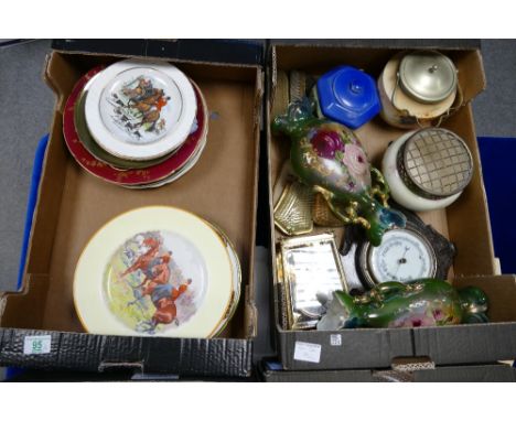 A mixed collection of item to include brass matle clock,oak framed barometer, base metal brush set, decorative wall plates et