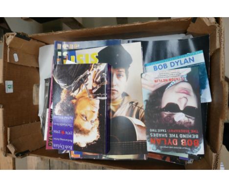 A large collection of Bob Dylan theme magazines and soft backed books 