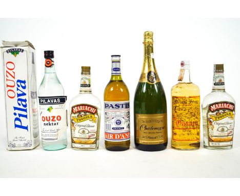 A Premium Charlemagne demi-sec magnum, together with two Mariachi bottles of Tequila, 960ml 38% vol, a bottle of Ouzo and a b