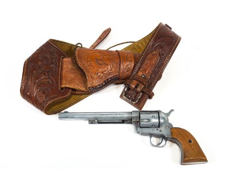 A replica Model Single Action Army 45 pistol, model 1974 in embossed leather holster