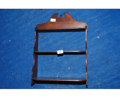 A hardwood display shelf. 19" high x 14 1/2" wide x 6" deep.