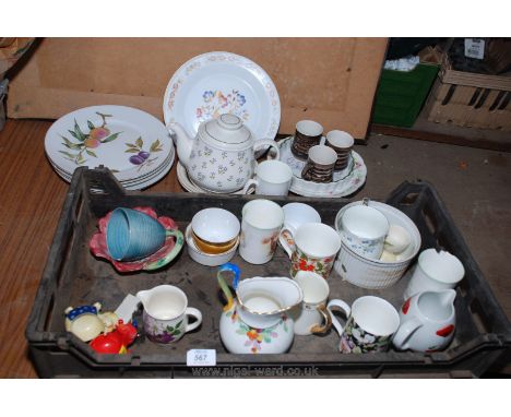 A Royal Worcester Evesham worn dinner plates, coffee mugs etc.