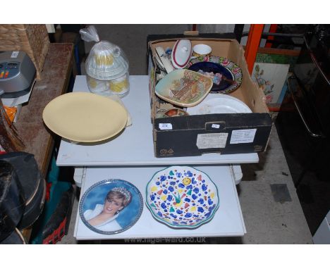A box of cups, saucers, plates, etc.