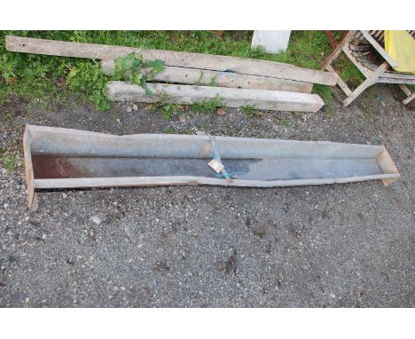 A galvanised feeding trough. 9ft long.