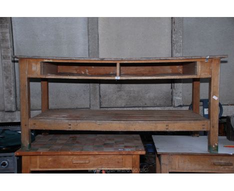 A Pine work-bench with slatted under-shelf and melamine top. 33 1/2" x 68" x 27".
