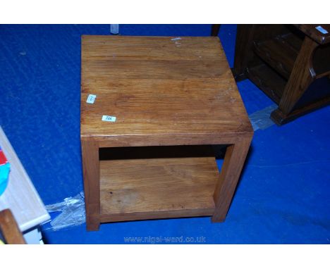 A modern square occasional table with under shelf. 20" x 20" x 19" high.