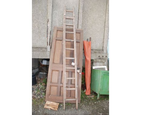 A 10 rung wooden double ladder.