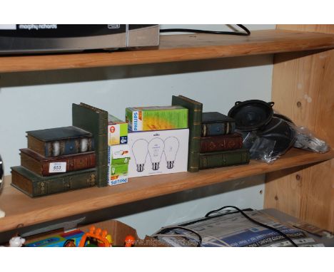 A pair of trinket pot bookends, speakers, etc.