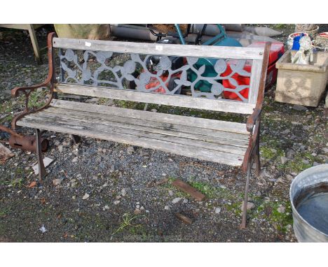 A pierced back wooden Bench, 50" long