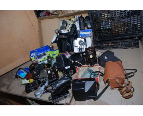 Two boxes of miscellaneous cameras, viewer and projector.