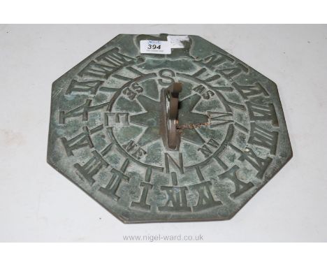 A brass sundial, 10 1/2" diameter.