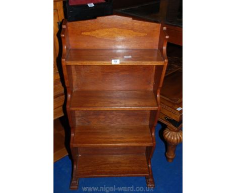 A four shelf bookcase. 21" wide x 42" high x 8" deep.