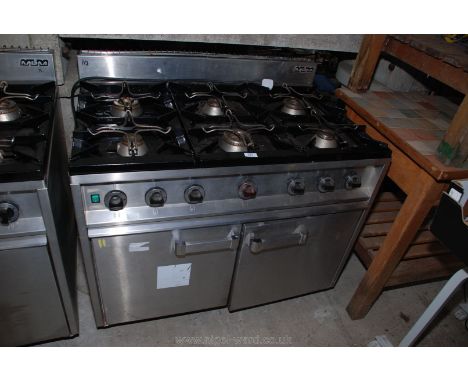 A NMB industrial six ring Range cooker (gas rings with electric oven). 41" long x 28" deep x 33" high.