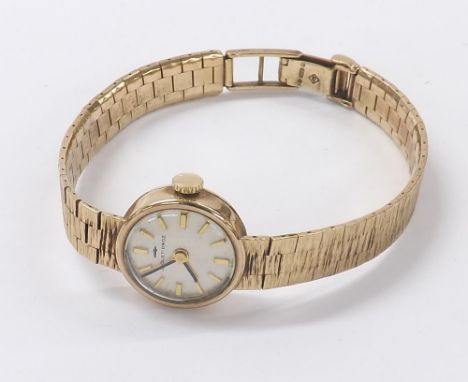 Jaquet-Droz 9ct lady's bracelet watch, London 1974, silvered dial and integral bracelet, 17 jewels, 21.6gm, 17mm - Condition 
