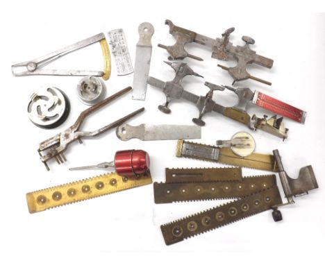 Selection of watchmakers tools including two turns, watch movement holders, pivot and wheel gouges etc