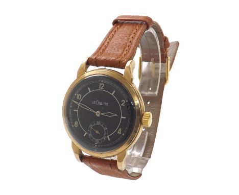 LeCoultre 9ct gentleman's wristwatch, Birmingham 1959, black dial with Arabic numerals and baton markers with subsidiary seco