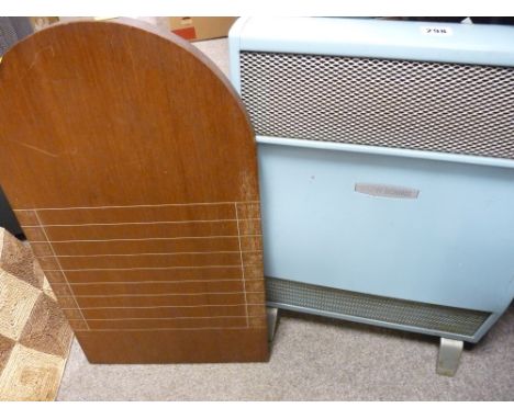 Vintage electric heater and a shove ha'penny board