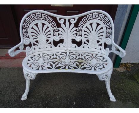 White painted metal garden bench