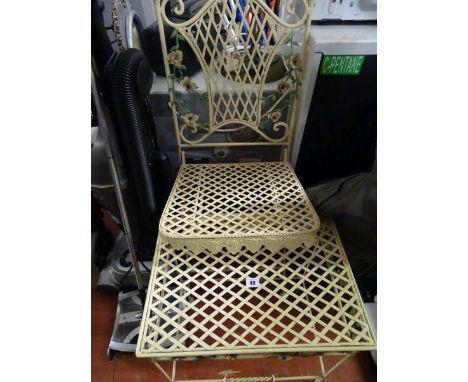 Cream metal garden seat and table