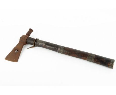 A WOODEN IRON AXE the handle inset with lead, 50cm in length Condition: some surface rust and marks