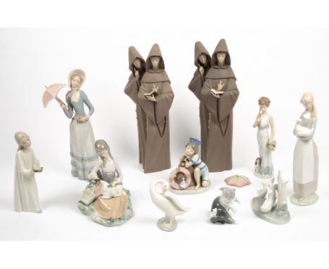 A COLLECTION OF LLADRO AND NAO PORCELAIN FIGURINES to include two Lladro monk figurines, each numbered 5156, 37.5cm in height