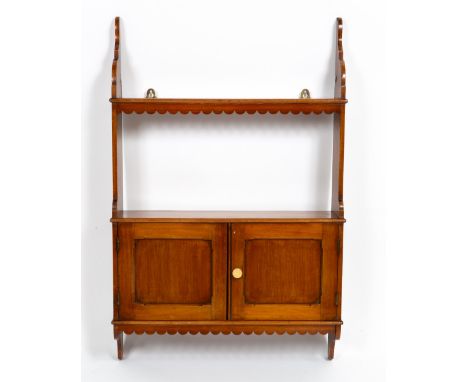 A VICTORIAN MAHOGANY HANGING WALL SHELF with twin panelled cupboard door, 52.4cm wide x 13cm deep x 81cm high together with a