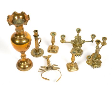 A COLLECTION OF BRASS WARE to include a pair of three branch candelabra, a Palmer &amp; Co patent candlestick, a brass lobste