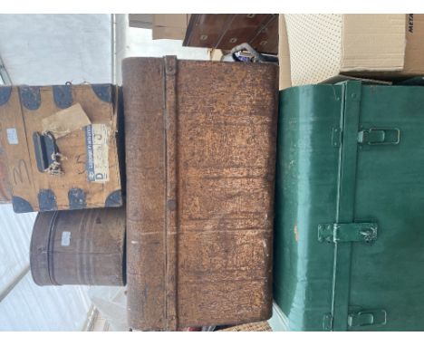 AN OLD TRUNK&nbsp;&nbsp;together with a green painted tin trunk, a further tin trunk, two hat tins and an old tuck box (6) Co