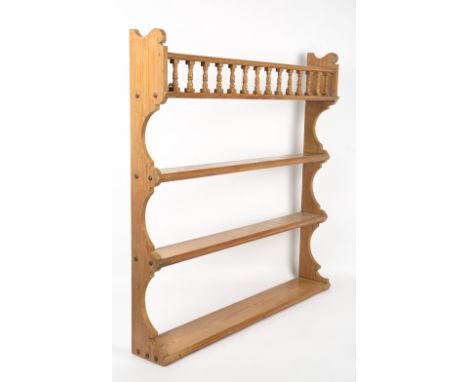 A VICTORIAN PINE FOUR TIER WALL SHELF 85cm wide x 13cm deep x 86cm high At present, there is no condition report prepared for