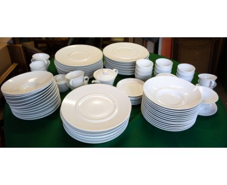 A FRENCH BERNARDAUD LIMOGES WHITE PORCELAIN PART DINNER SERVICE consisting of thirteen bowls, 25.5cm diameter; nine various p