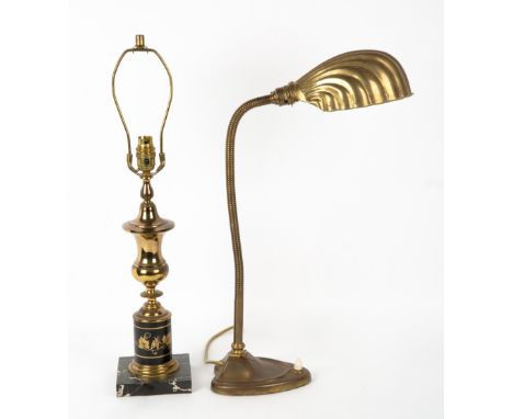 A BRASS ADJUSTABLE TABLE LAMP with shell moulded shade, 51cm high (adjustable) together with a turned brass table lamp on a s