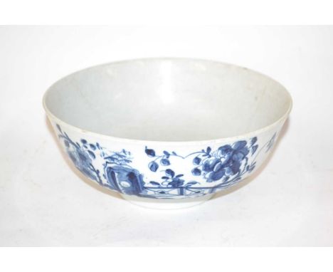 An 18th Century Worcester porcelain punch ow with blue floral decoration and workmans mark to base, 21cm diameter (hairline t