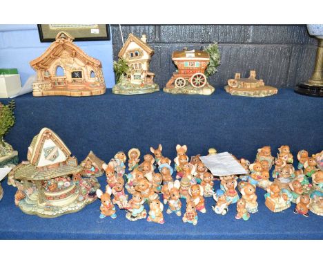 An extensive collection of Pendelfin figures together with a comprehensive range of accessories including various stands, pia