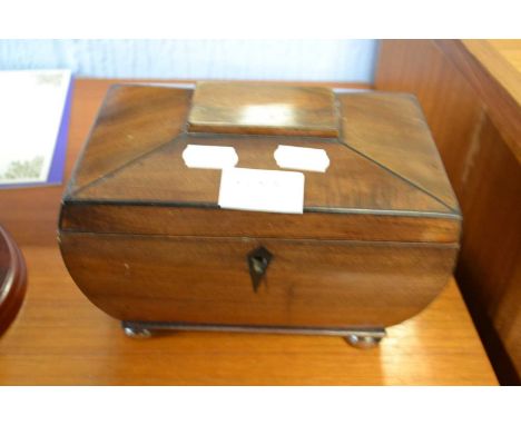 A small Georgian sarcophogus formed mahogany tea caddy, 19cm wide