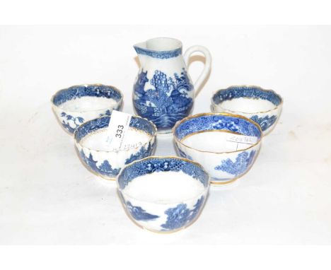 A group of five Caughley tea bowls together with a Caughley sparrowbeak jug