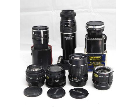 A quantity of lenses: to include an X-Fujinon f-50 no.492183; a Canon 50mm no. 293931 with filter; a SMC Pentax-M 135mm no.70