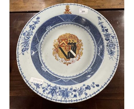 An 18th Century Chinese Export armorial basin, 40cm diameter, the well with large painted armorial decoration (broken in half