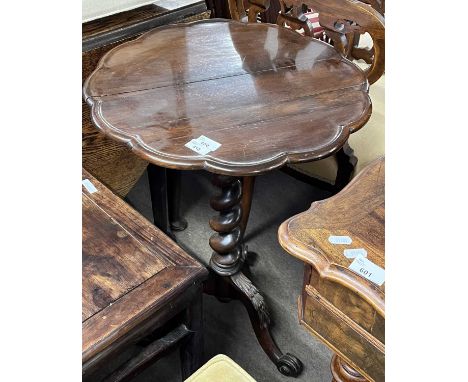 A Victorian rosewood wine table with shaped top, barley twist column and tripod base with scrolled feet, 73cm high (a/f)