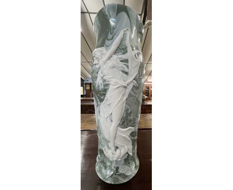 A large vase decorated in relief with Art Nouveau style maidens, possibly Limoges or Paris porcelain, 36cm high
