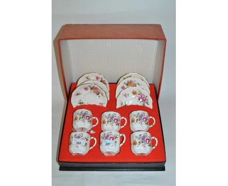 A Royal Crown Derby coffee set decorated with Derby posies, boxed set of six coffee cups and saucers, in original box