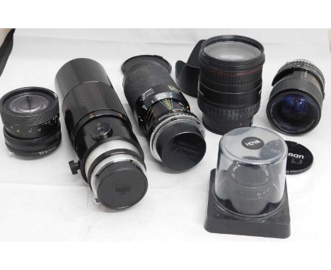 A quantity of camera lenses: to include a Sigma DL Hyperzoom Macro 28-200mm no. 1026833 with Luxon Haze 72mm filter, with len